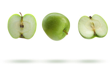 Whole and halved apple in the air on a transparent background.