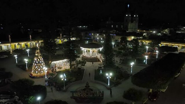 Establishing shot of Small town city center ready for Christmas. Shot in the Principal Garden.