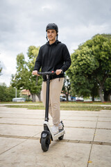 caucasian man drive or ride electric kick scooter e-scooter © Miljan Živković