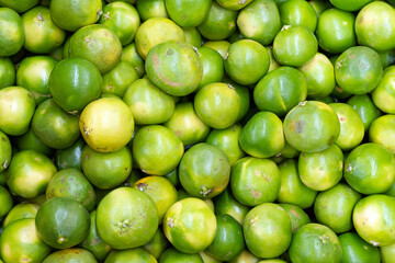 Lime fruits as background