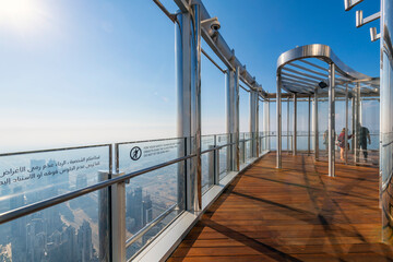 The outdoor open air terrace viewing observation deck at floor 154 of the Burj Khalifa, the tallest building in the world, in Dubai, United Arab Emirates.