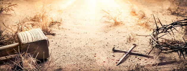 Crown Of Thorns, Hammer, Nails And Blood Drops Laying On Sandy Dirt Path - Crucifixion of Jesus...