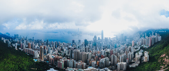 Aerial view panorama cityscape of Hong Kong city. Transportation and travel.	Cargo ship of business...