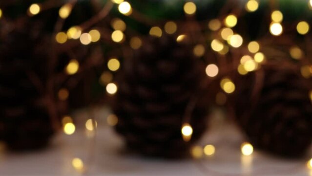 Christmas lights in the night. Christmas bokeh lights on dark background. New year, holiday concept.