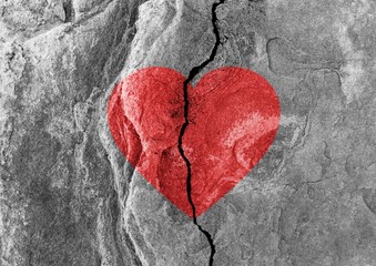 Shape of red heart on cracked texture