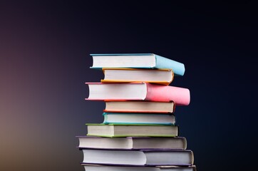 Reading book pile set on the dark background