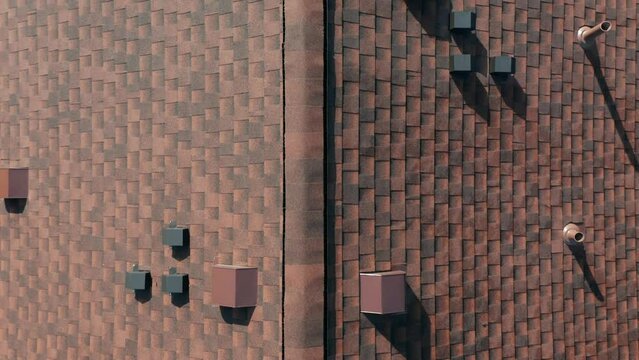 Aerial top down, residential roof with red brown shingles