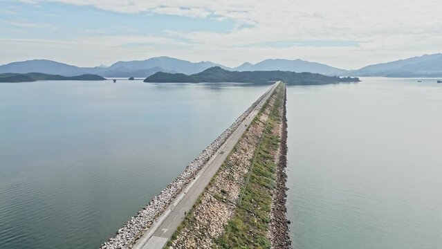 Plover Cove Reservoir in Tai Po Tai Mei Tuk, Hong Kong, aerial dam view, 2nd Largest Reservoir and Biking Spot for Tourism