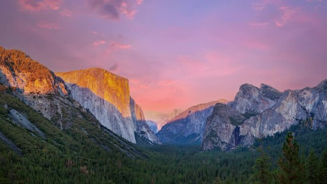 Time lapse video of Yosemite valley nation park during sunset view from tunnel view on twilight time. Yosemite nation park, California, USA.