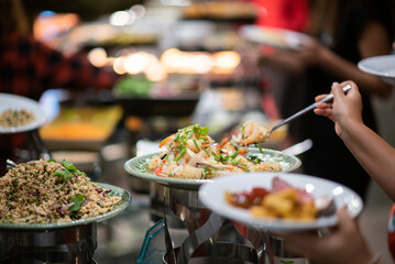 scooping the food, catering, dinner time