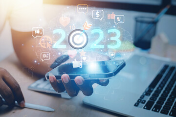 2023 business concept, business people set goals to create an online communication network, global Internet technology to develop a corporate information management system.
