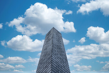 Fototapeta na wymiar Argentina Obelisk Logo Blue Sky White Clouds Cloudy