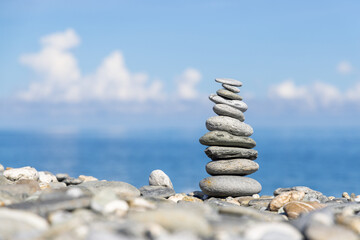Stack of stones on the sea beach
