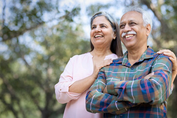 Fototapeta premium Happy senior couple spending leisure time in park during weekend.