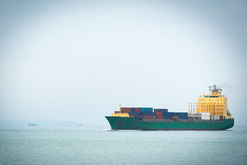 An image of a container ship going to a cargo port.