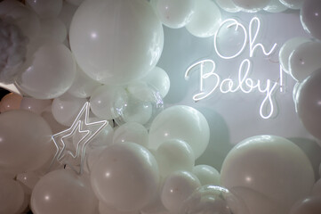 Close up the photo zone from white balloons with white copy space for your text. Party decorated with balloons