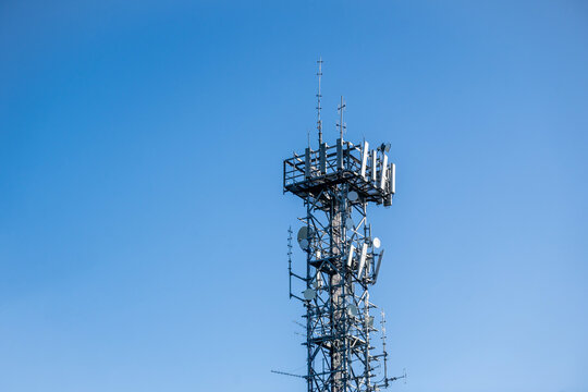 Radio, communication and cell tower on blue sky background. Australia