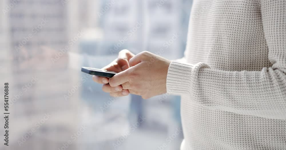 Poster hands, phone and texting by window for social media, chatting or online conversation at the office. 