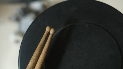 Drum practice pad and drum sticks © Dennis
