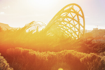 Tbilisi Bridge Of Peace At Twilight. Bridge Of Peace Is A Bow-shaped Pedestrian Bridge Over Kura River In Tbilisi, Capital Of Georgia, Linking Rike Park With Old Town In Central Tbilisi. Important © Great Brut Here