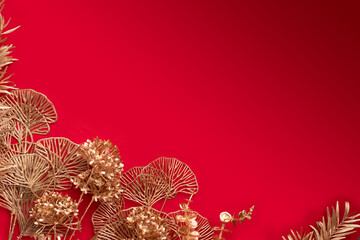 Red and gold background for New Year, Christmas, Celebration. Gold flowers on the side.