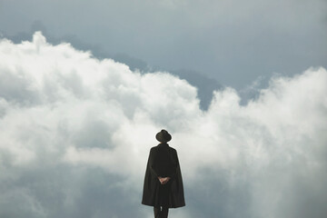surreal meditative man in front of a cloudy sky