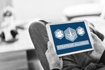 Strategic alliance concept on a tablet