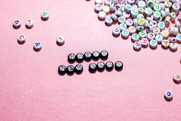 Conceptual of Happy New Year Words made with Colorful Alphabetical Beads