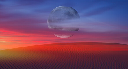 Beautiful sand dunes in the Sahara desert at sunrise with super full moon - Sahara, Morocco 