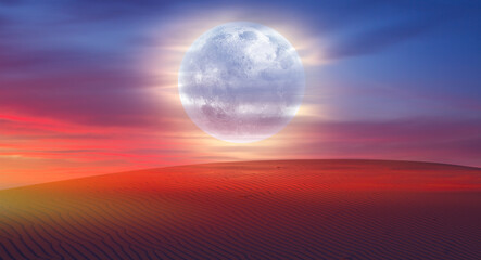 Naklejka na ściany i meble Beautiful sand dunes in the Sahara desert at sunrise with super full moon - Sahara, Morocco 