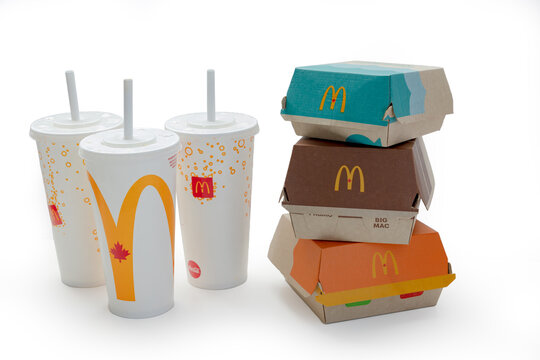 Calgary, Alberta, Canada. Dec 15, 2022. A McDonald's A McCrispy, Double Bigmac and Filet-O-Fish with soft drinks drinks.