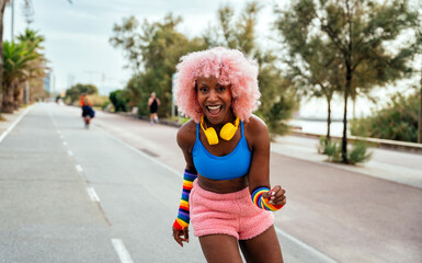 Beautiful woman skating with roller skates and having fun.