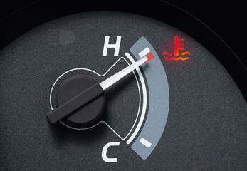 Needle pointer at the high temp point of the temperature gauge in the vehicle radiator and the...