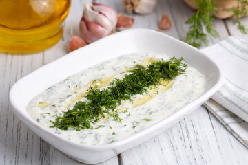 Haydari is a type of yogurt made from certain herbs and spices, combined with garlic. Turkish cuisine.