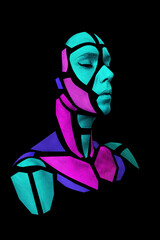 Portrait of a human with creative art makeup posing in the studio. Shape of colored polygons on beautiful face, neck and shoulders. Parts of face isolated on black background.