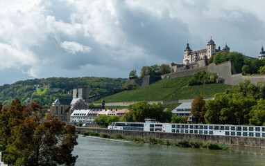 Fototapeta na wymiar View over the vineyards and the river Main to the Marienberg Castle in Wuerzburg