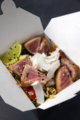 Delicious wok noodles box container. Chinese and asian takeaway fast food.
