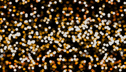 Orange abstract bokeh layered blurred shiny particles as cover decoration on black background