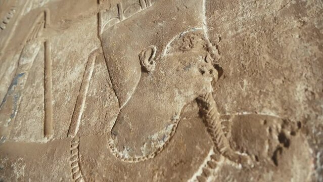 A Relief Image Of A Pharaoh On The Stele Of An Ancient Egyptian Temple