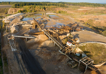 Sand Making Plant and Belt conveyor in mining quarry. Gold mining in opencast.  Sand crushing and...