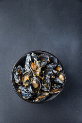 delicious mussels cooked in sauce.
