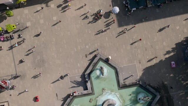 People Walking At The Urban Plaza Tapatia Near Downtown Guadalajara, Jalisco, Mexico. Aerial Shot