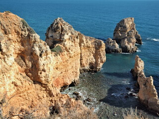 Fototapeta na wymiar Rocky coastline near Ponte da Piedade, Lagos, Algarve - Portugal