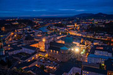 Aerial view of Salzburg at dusk from Hohensalzburg Fortress walls, Austria