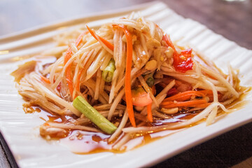 Thai papaya salad , Somtam (Street food), with roasted chicken and fresh