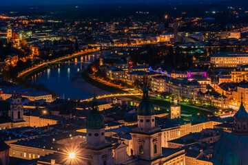 Fototapeta na wymiar Aerial view of Salzburg at dusk from Hohensalzburg Fortress walls, Austria