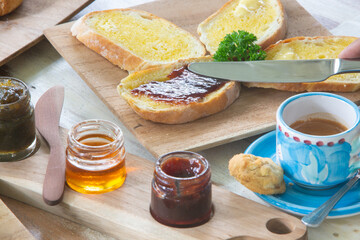 Nice breakfast, bread, coffee, marmalade, croissant, honey, butter