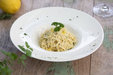 fresh pasta lemon wood table
