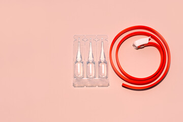 Antiparasitic collar and product in flea drops for cats and dogs on the background with a copy of...
