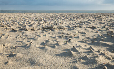 Fototapeta na wymiar the sand on the beach and sky and Horizon in the background